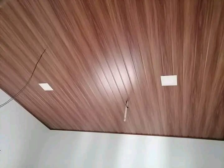 Wood-finish panel ceiling with recessed square lights